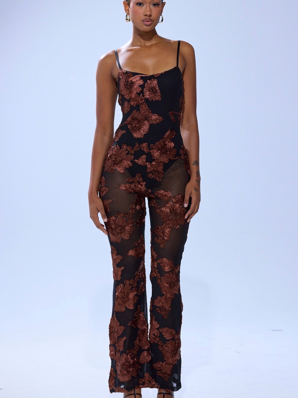 AKIRA Black Sheer Jumpsuit with Brown Floral Appliqué
